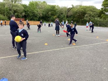 1st & 2nd Classes keeping fit with 5th & 6th Classes!